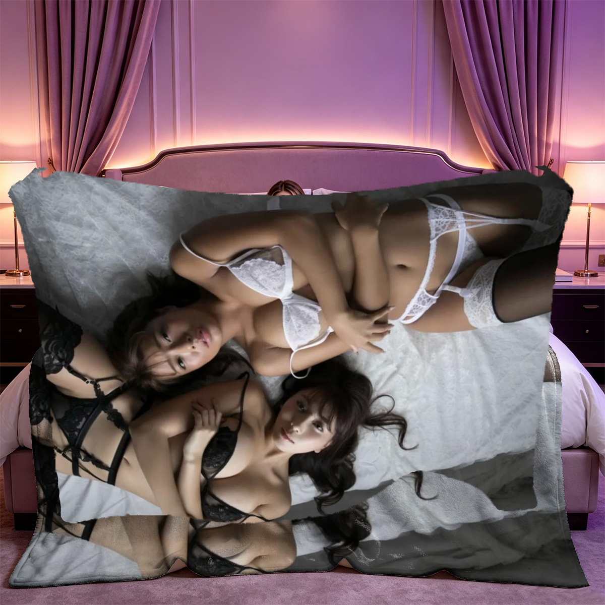 Aya Shalkar in silver bikini on black leather couch. - Blanket