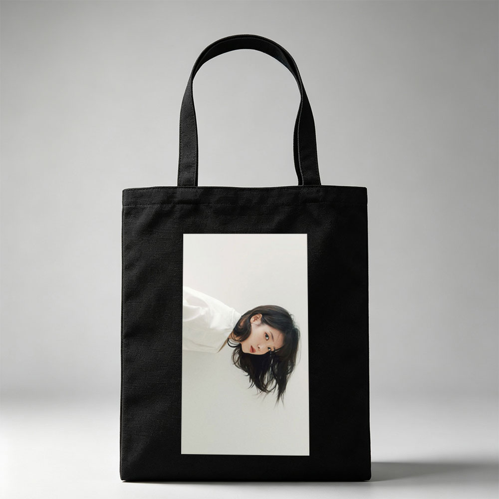 IU in a Minimalist Portrait with Soft Lighting and Neutral Background - Canvas tote bags