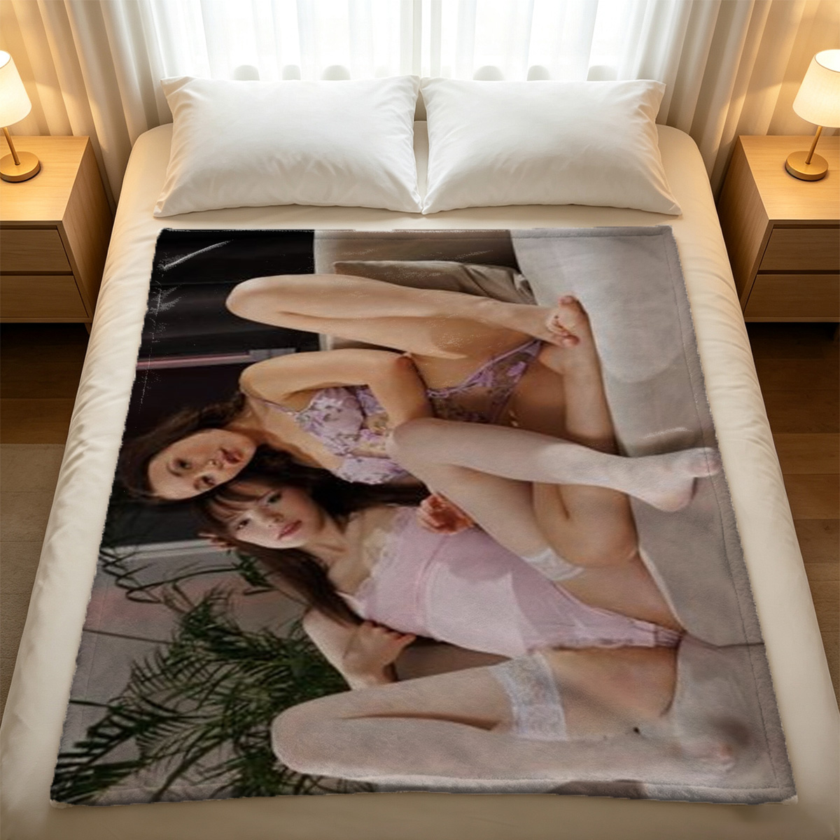 Two Glamorous Women in Black and White Outfits Posing on an Ornate Chair - Blanket