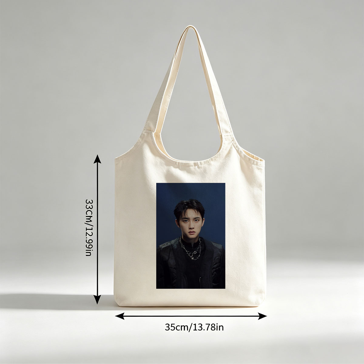Do Kyung Soo in a Stylish Black Outfit with Layered Necklaces Against a Dark Blue Background - Canvas shoulder bags/