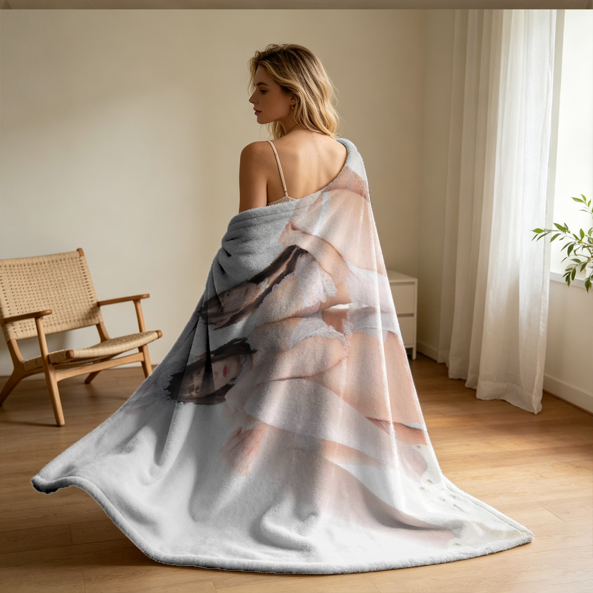 A young woman in pink lace lingerie lying seductively on a bed. - Blanket