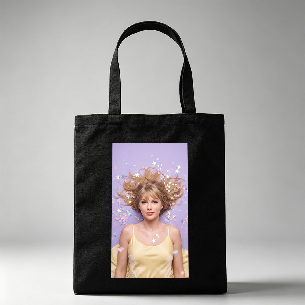 Taylor Swift Lying on Purple Background with Confetti and Stars Around Her Hair - Canvas tote bags