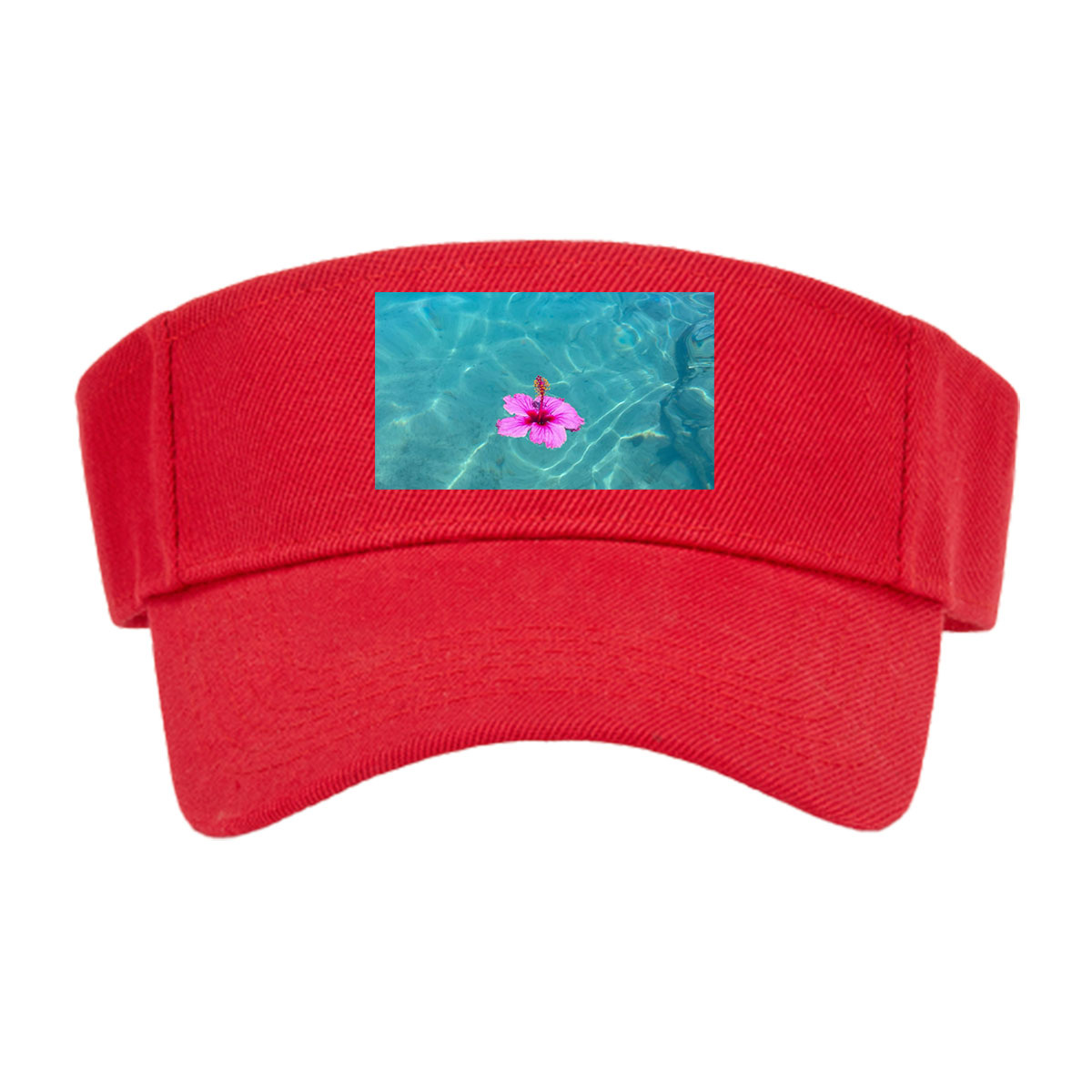 Pink hibiscus floating on crystal clear turquoise water -  Visor cap
