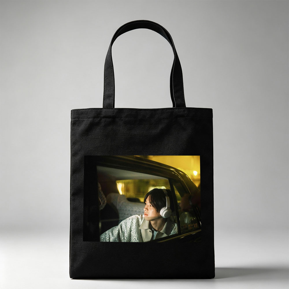 Yosuke Sugino in a Car at Night Wearing Headphones and Looking Out the Window - Canvas tote bags