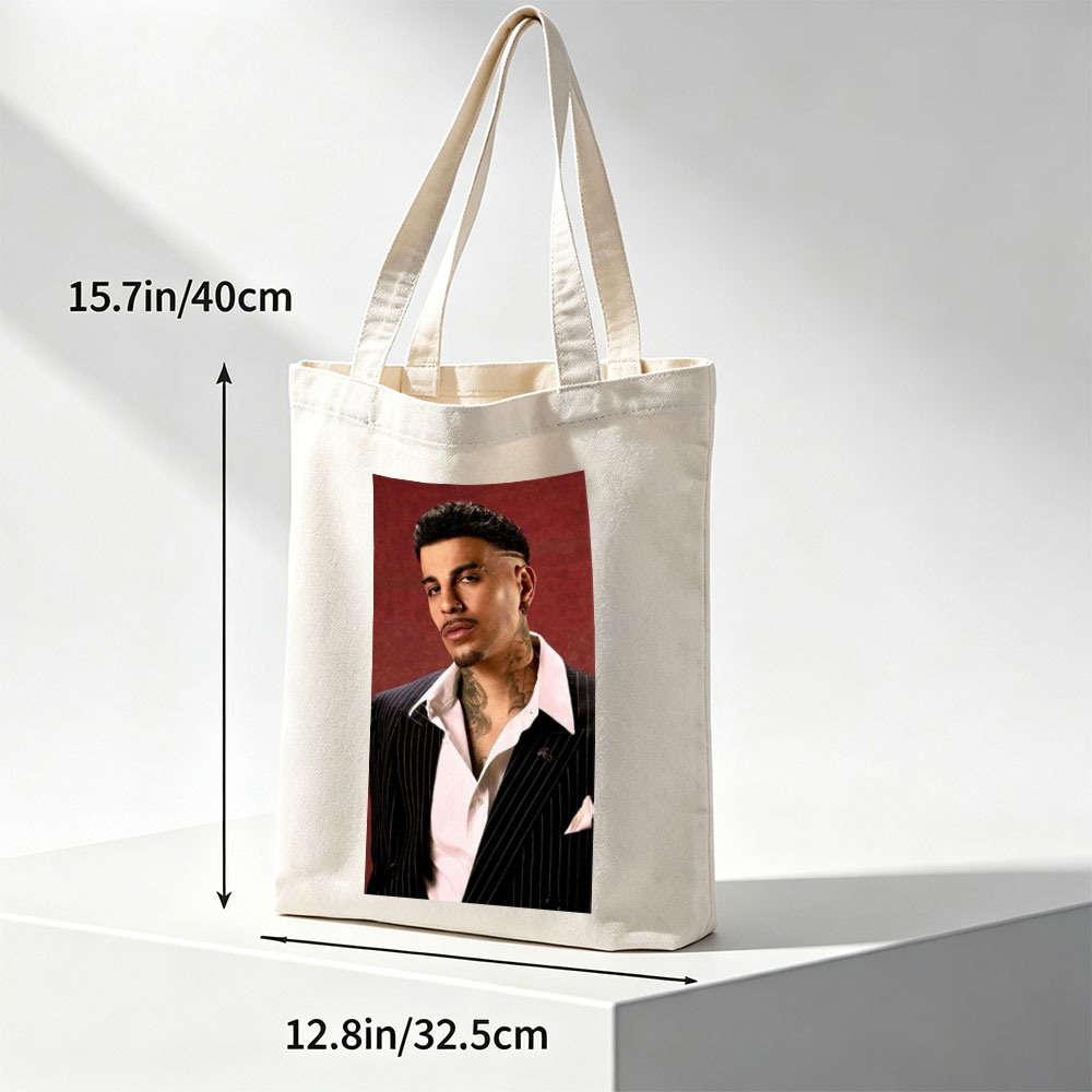 Maluma in a Pinstripe Suit with Visible Neck Tattoos Against a Red Background - Canvas tote bags