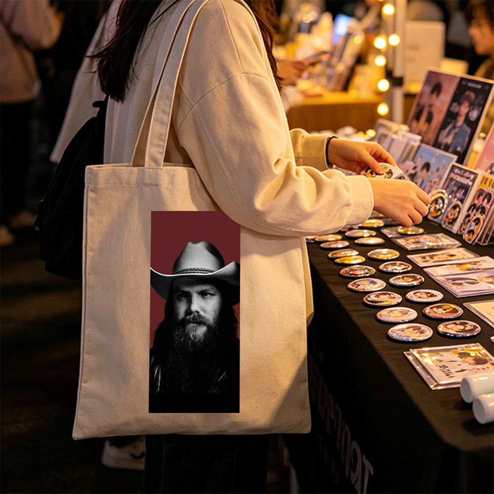 Chris Stapleton in a Cowboy Hat with a Bearded Portrait Against a Red Background - Canvas tote bags