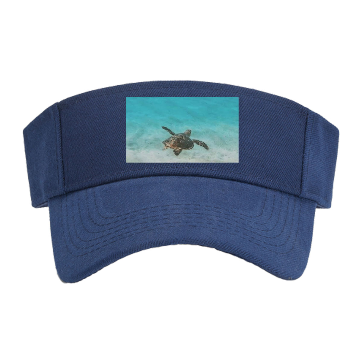 Sea turtle swimming in clear blue water over sandy ocean floor -  Visor cap