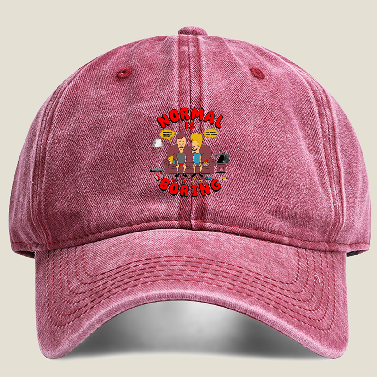 Normal Is Boring: Two Cartoon Characters on Couch with Chaos Around - Washed Denim - Baseball Cap