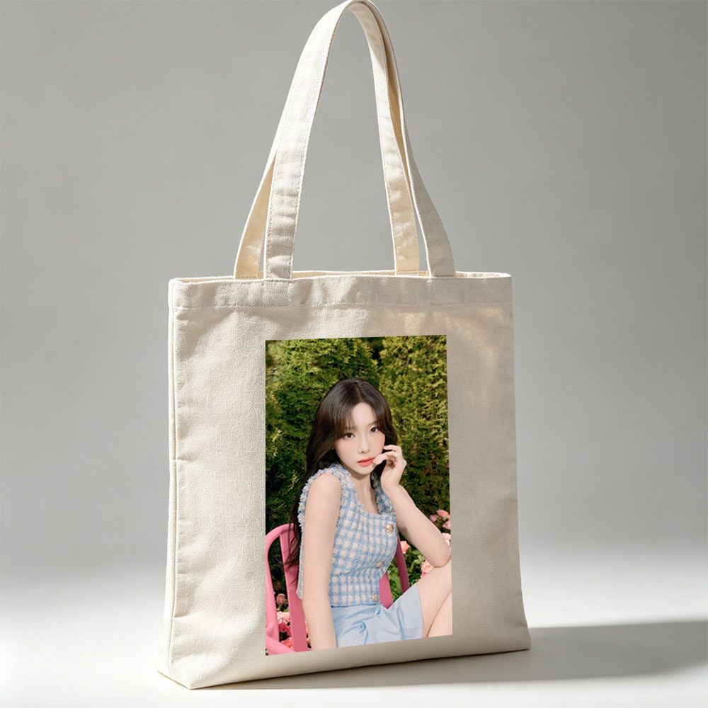 Tzuyu in a Garden Scene Wearing a Blue Checkered Top and Light Blue Skirt, Sitting on a Pink Chair Amidst Greenery and Flowers - Canvas tote bags