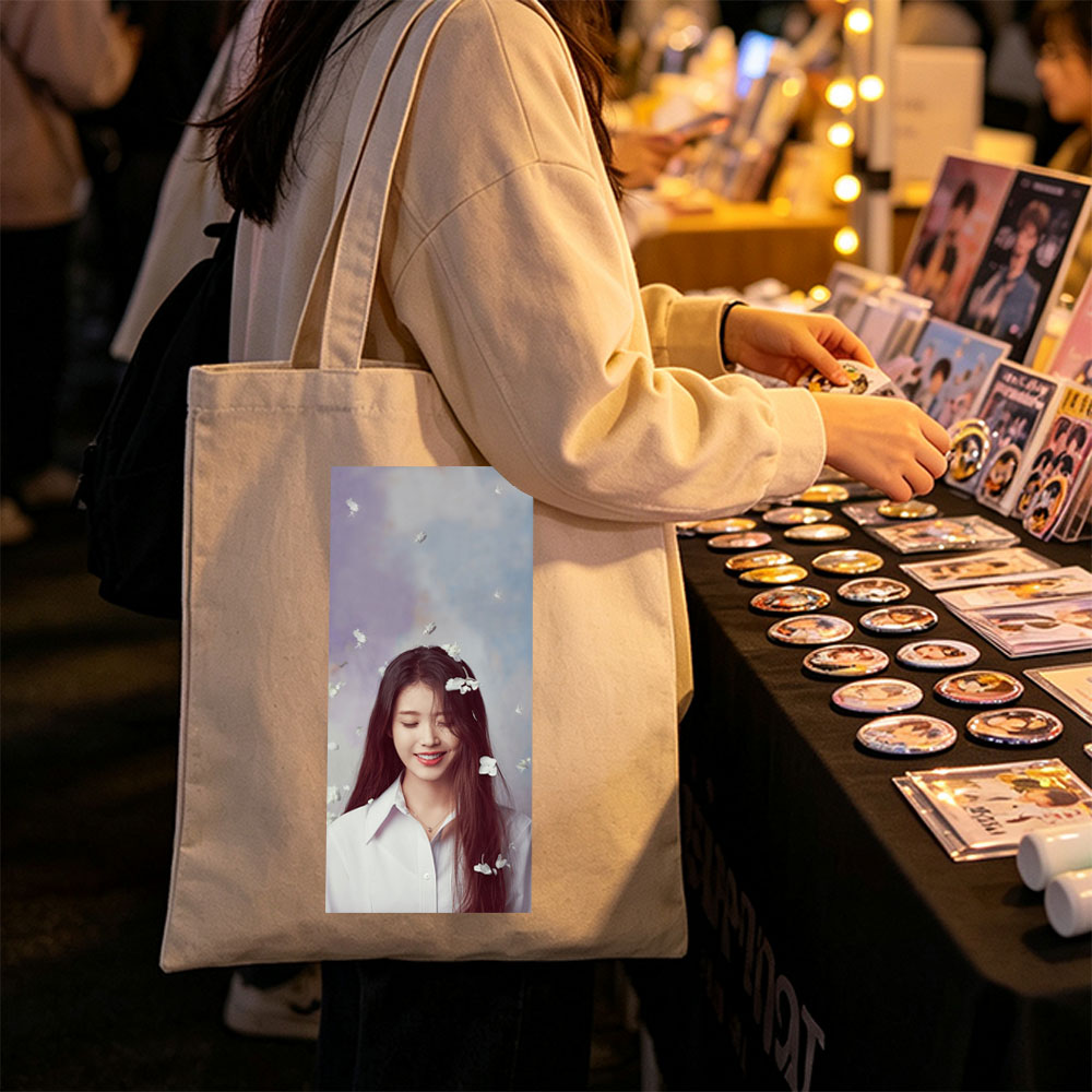 IU in a Dreamy Floral Scene with White Flowers Floating Around Her - Canvas tote bags