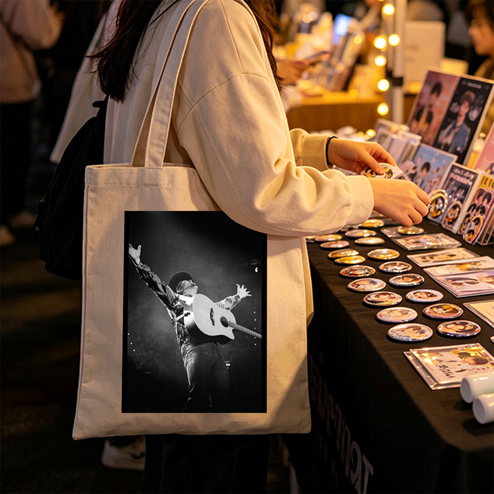 Johnny Cash Performing on Stage with Acoustic Guitar and Arms Raised - Canvas tote bags