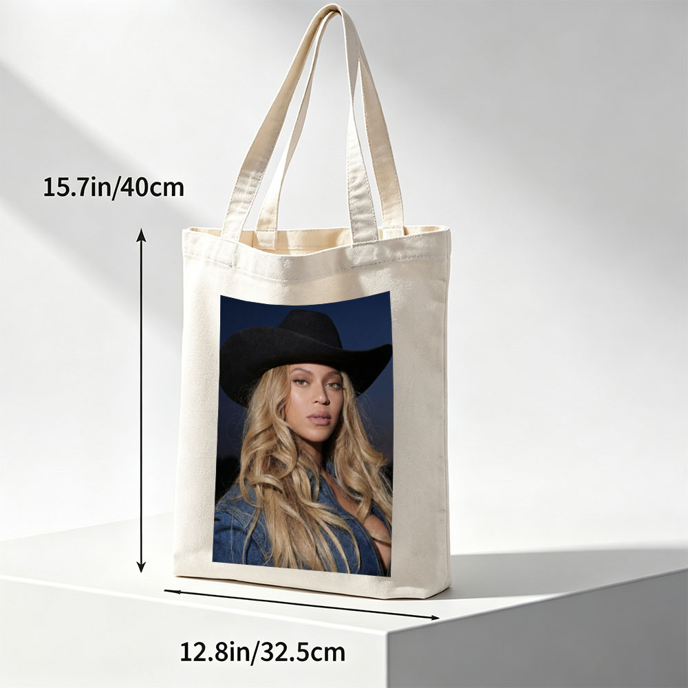 Beyonce in Cowboy Hat and Denim Jacket Against Dark Sky Background - Canvas tote bags