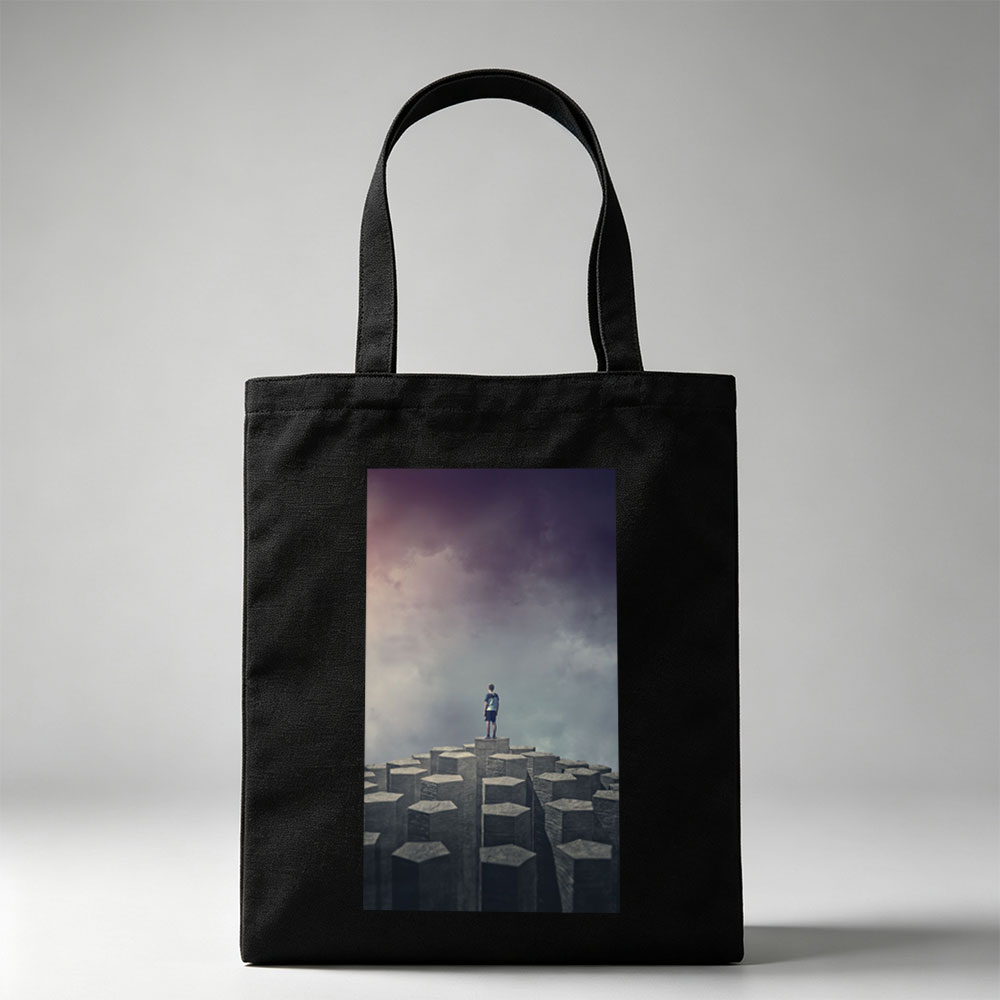 Imagine Dragons Standing on Stone Pillars Under Dramatic Sky - Canvas tote bags
