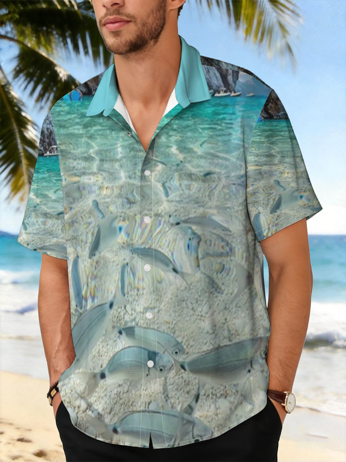 Clear waters reveal schools of fish swimming near a rocky shore with boats in the distance. -  Shirt