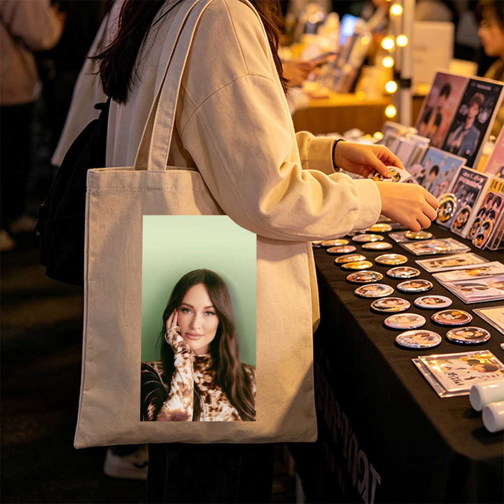 Kendall Rae - Portrait - Woman with Long Brown Hair Wearing Tie-Dye Top Against Green Background - Canvas tote bags