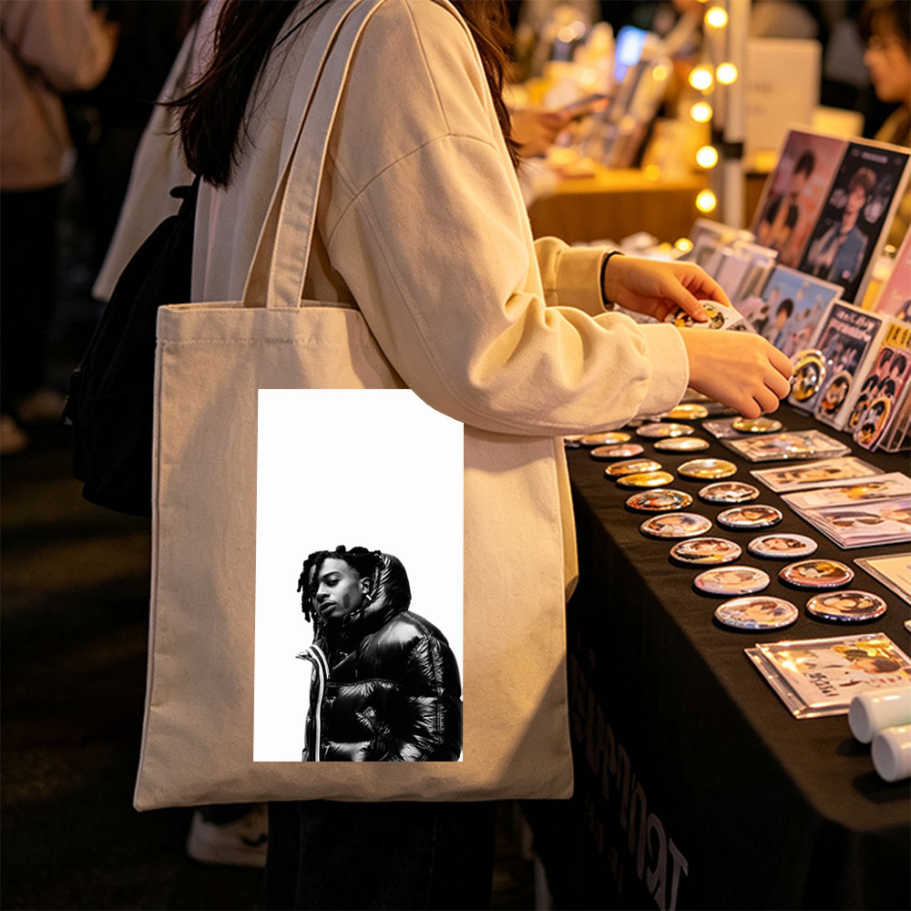 Lil Durk in a Bold Black Puffer Jacket Against a Stark White Background - Canvas tote bags