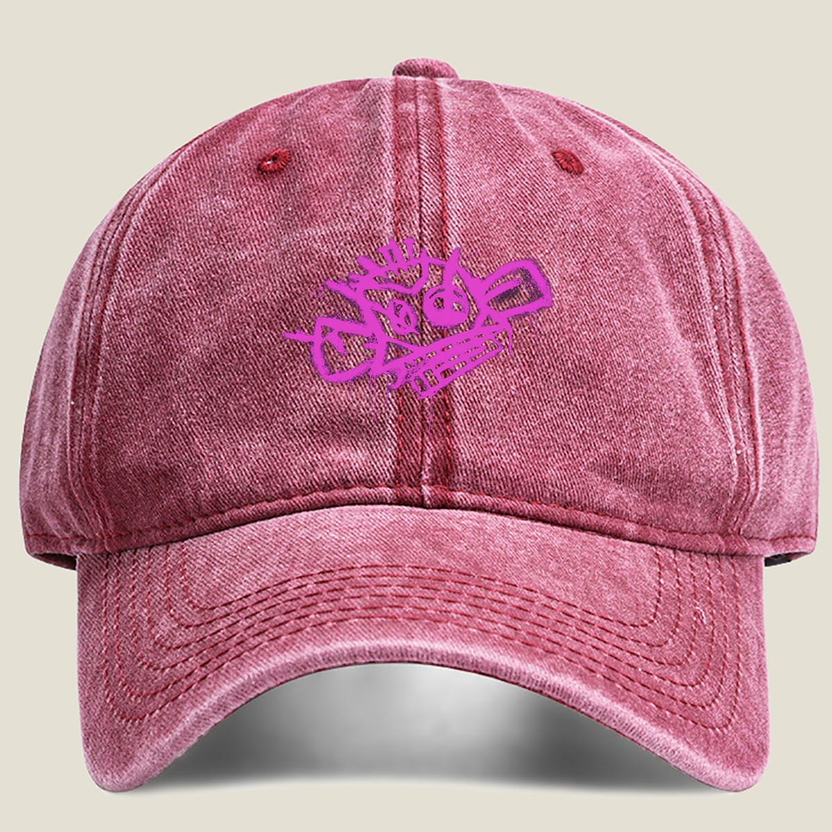Graffiti-style pink skull with crown and crossbones on black background - Washed Denim - Baseball Cap