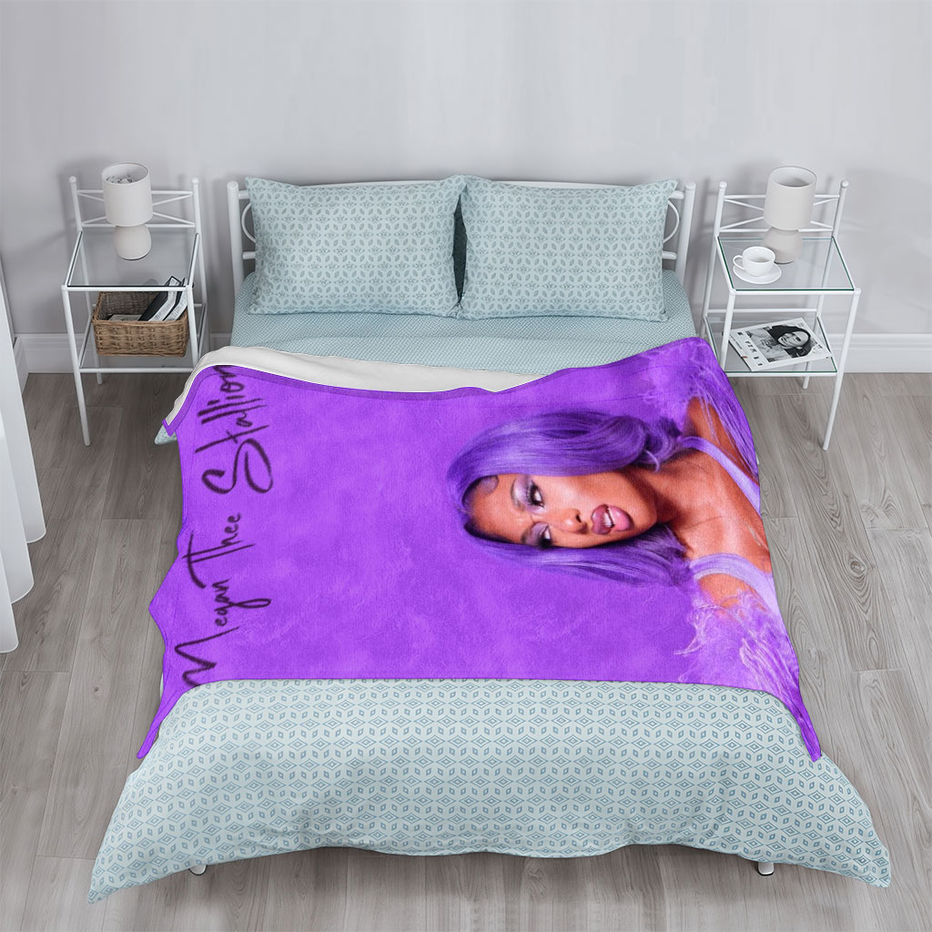 Megan Thee Stallion in Purple Feathered Outfit Against Vibrant Purple Background - Blankets