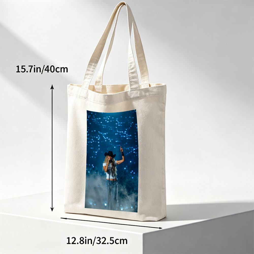 Miranda Lambert on Stage Performing with a Microphone and Cowboy Hat Under Blue Lights - Canvas tote bags