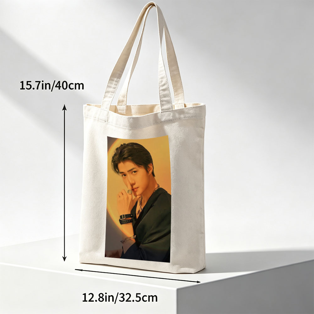 Felix from Stray Kids in a Stylish Pose with Dramatic Lighting and Fashion Accessories - Canvas tote bags