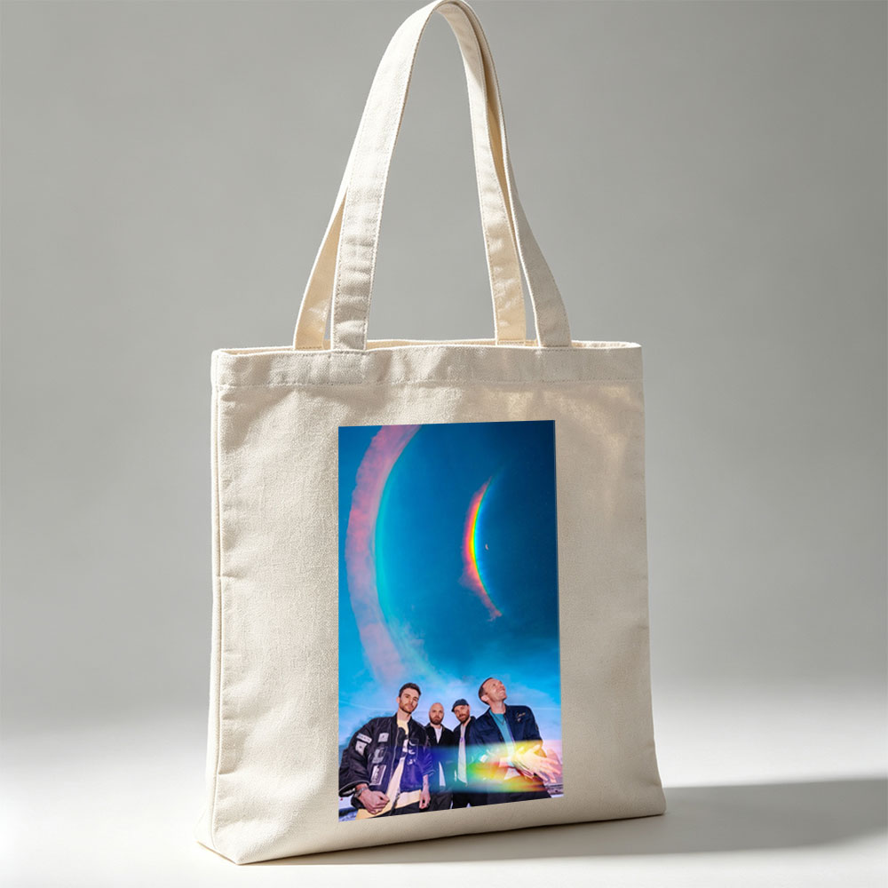 Coldplay in a Cosmic Scene with Rainbow Halo and Starry Sky Background - Canvas tote bags