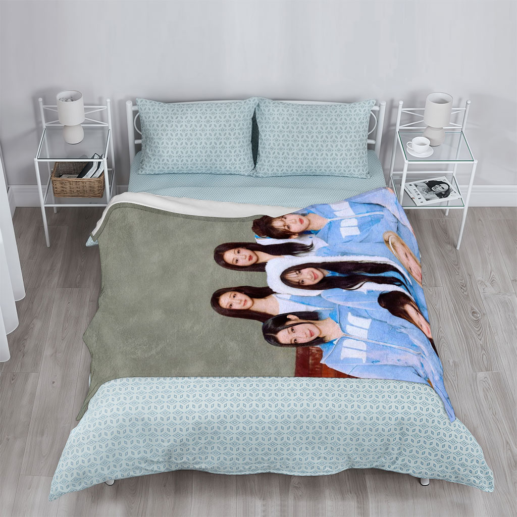 BABYMONSTER Group Photo in Matching Blue Outfits with Furry Hoodies and Minimalist Background - Blankets