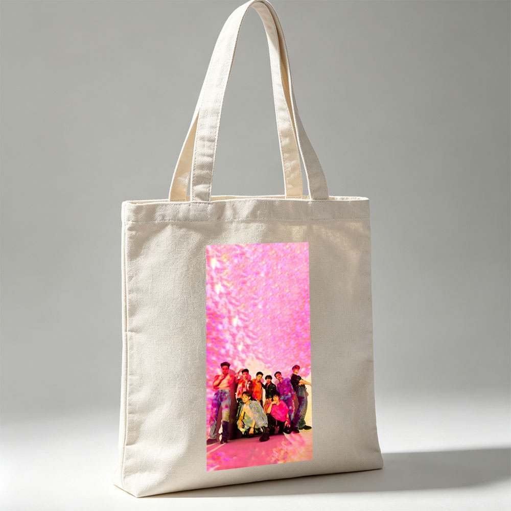 SEVENTEEN in a vibrant pink-lit scene with dynamic poses and colorful outfits - Canvas tote bags