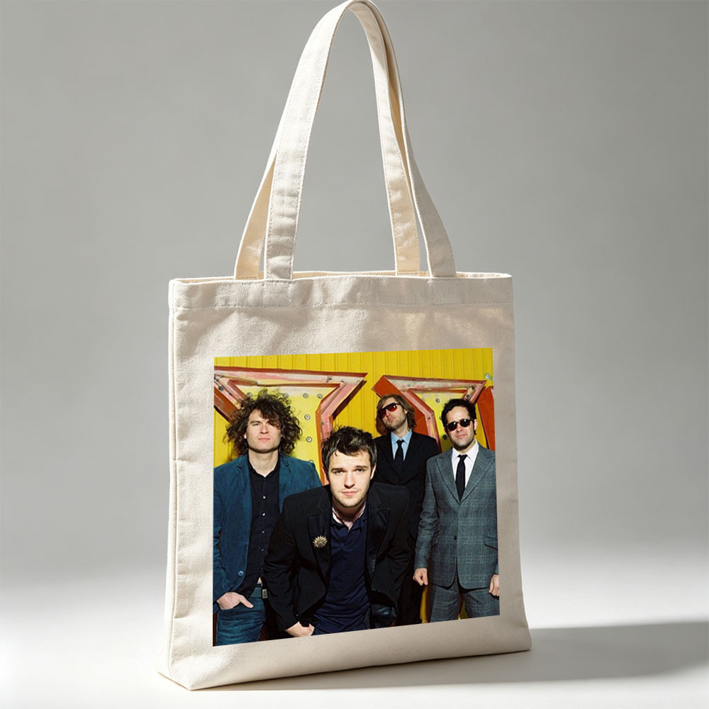 The Killers Band Members in Formal Wear Against a Vibrant Yellow Background - Canvas tote bags