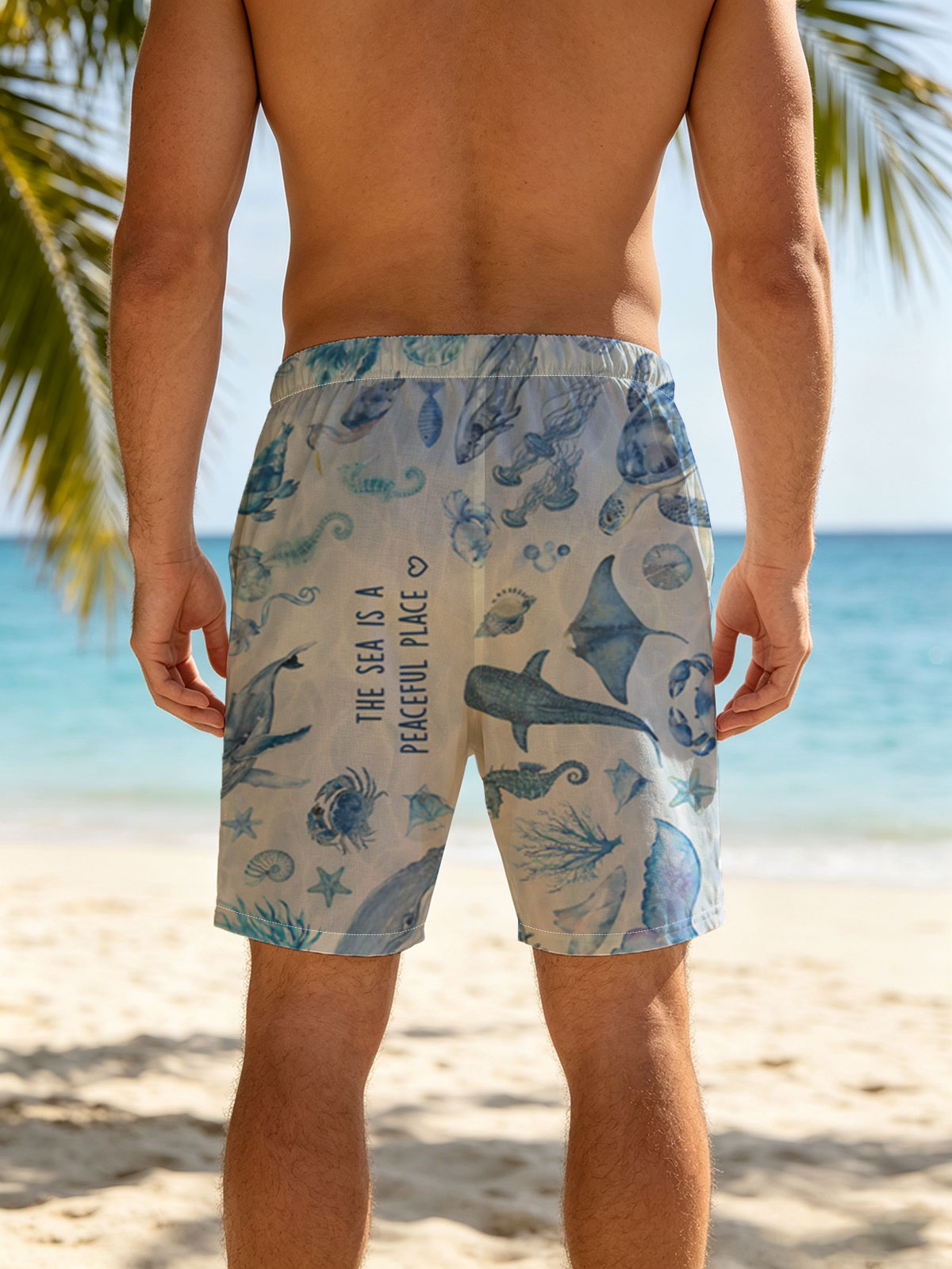 Underwater Serenity: Marine Life in Blue Hues -  Beach shorts