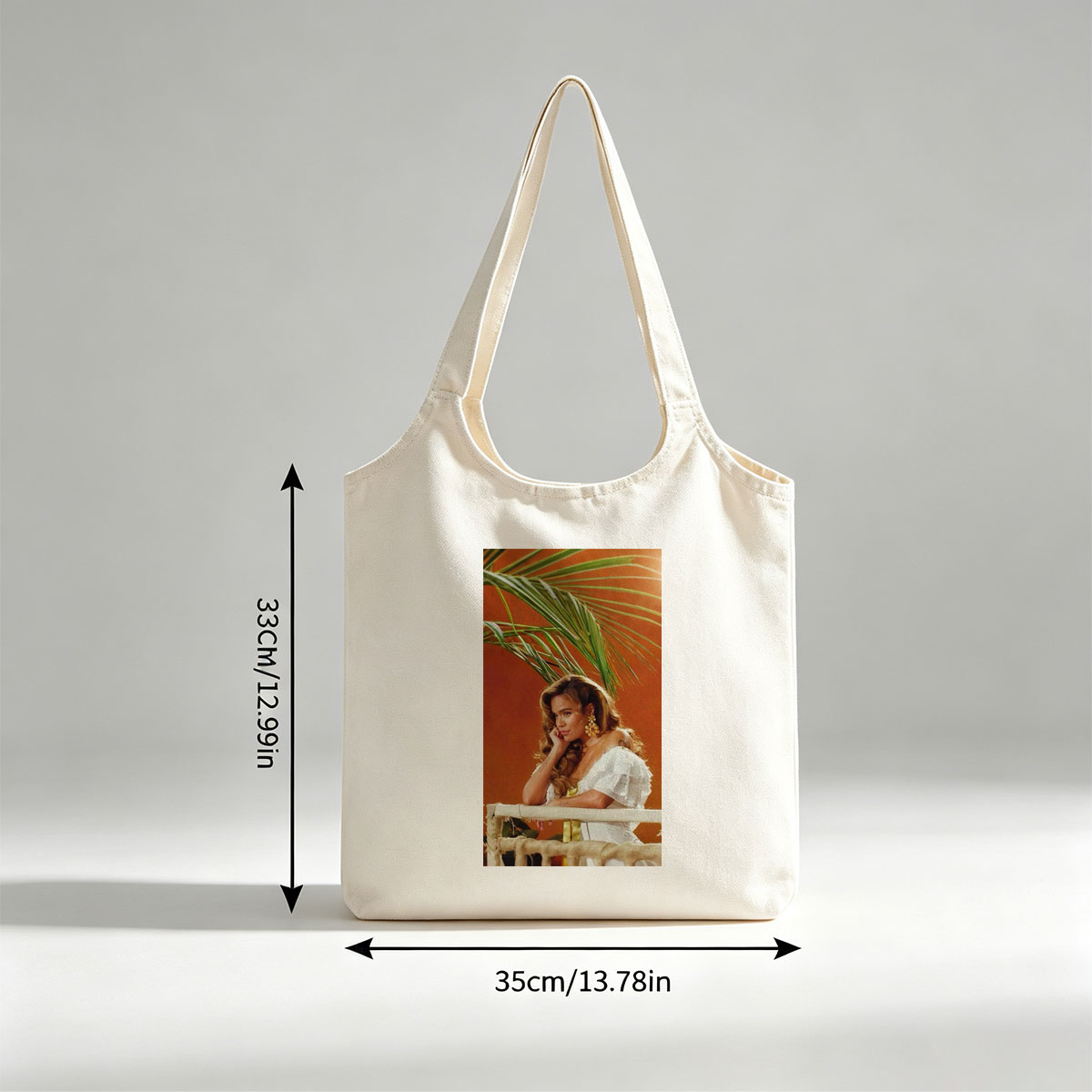 Maren Morris in a Tropical Scene Wearing a White Ruffled Dress with Palm Leaves in the Background - Canvas shoulder bags/