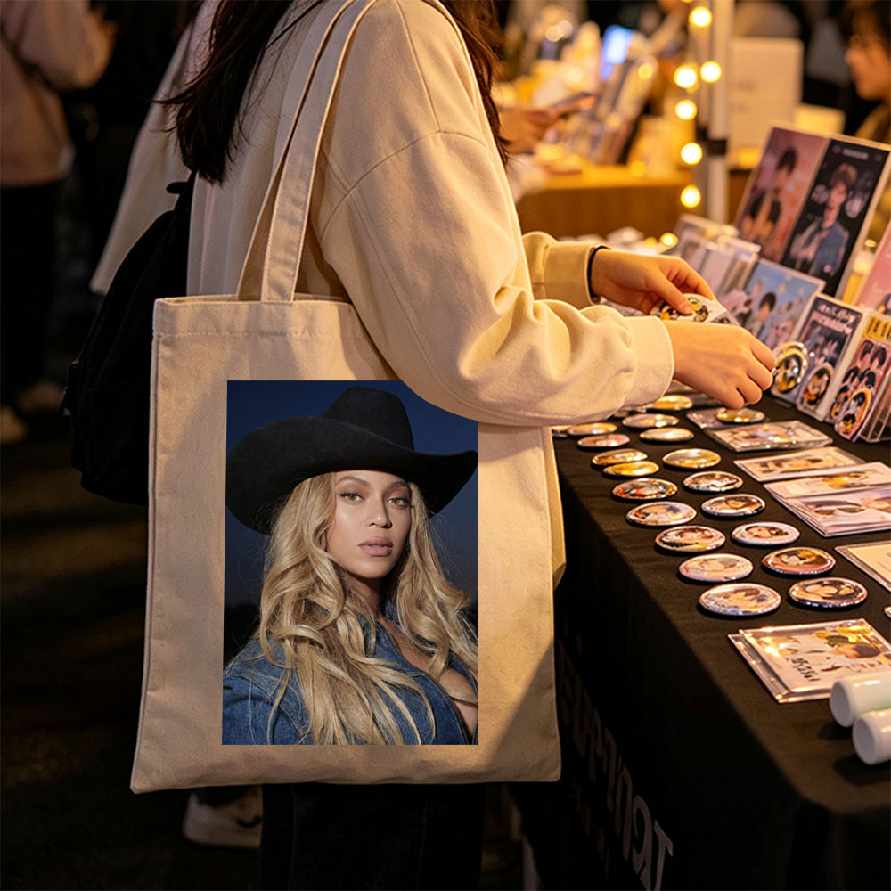 Beyonce in Cowboy Hat and Denim Jacket Against Dark Sky Background - Canvas tote bags