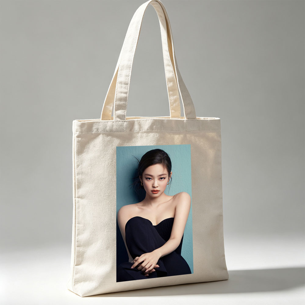 Jennie Kim in Elegant Black Strapless Dress Against Teal Background - Canvas tote bags