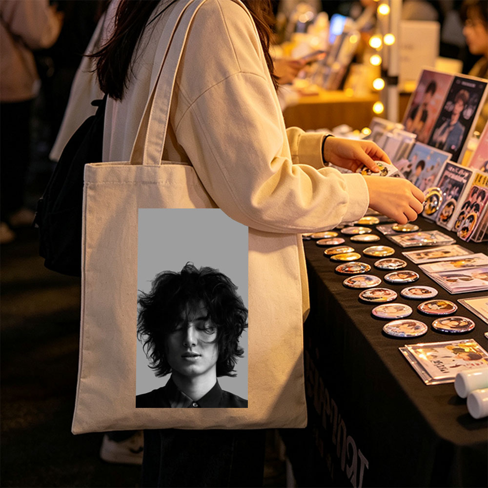Timothée Chalamet Close-Up Black and White Portrait with Messy Hair and Closed Eyes - Canvas tote bags