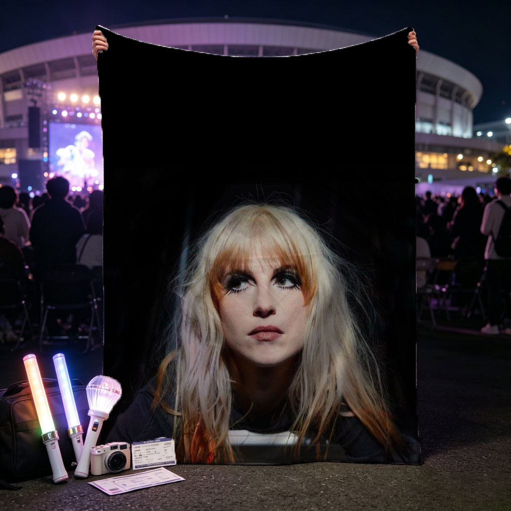Hayley Williams in a Dramatic Portrait with Intense Gaze and Blonde Hair Against Dark Background - Blankets