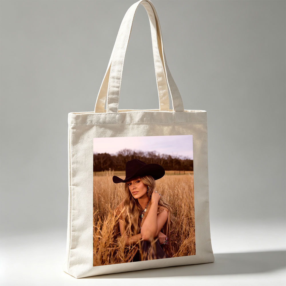 Paris Hilton in a Field of Golden Grass Wearing a Black Cowboy Hat and Boho Outfit - Canvas tote bags