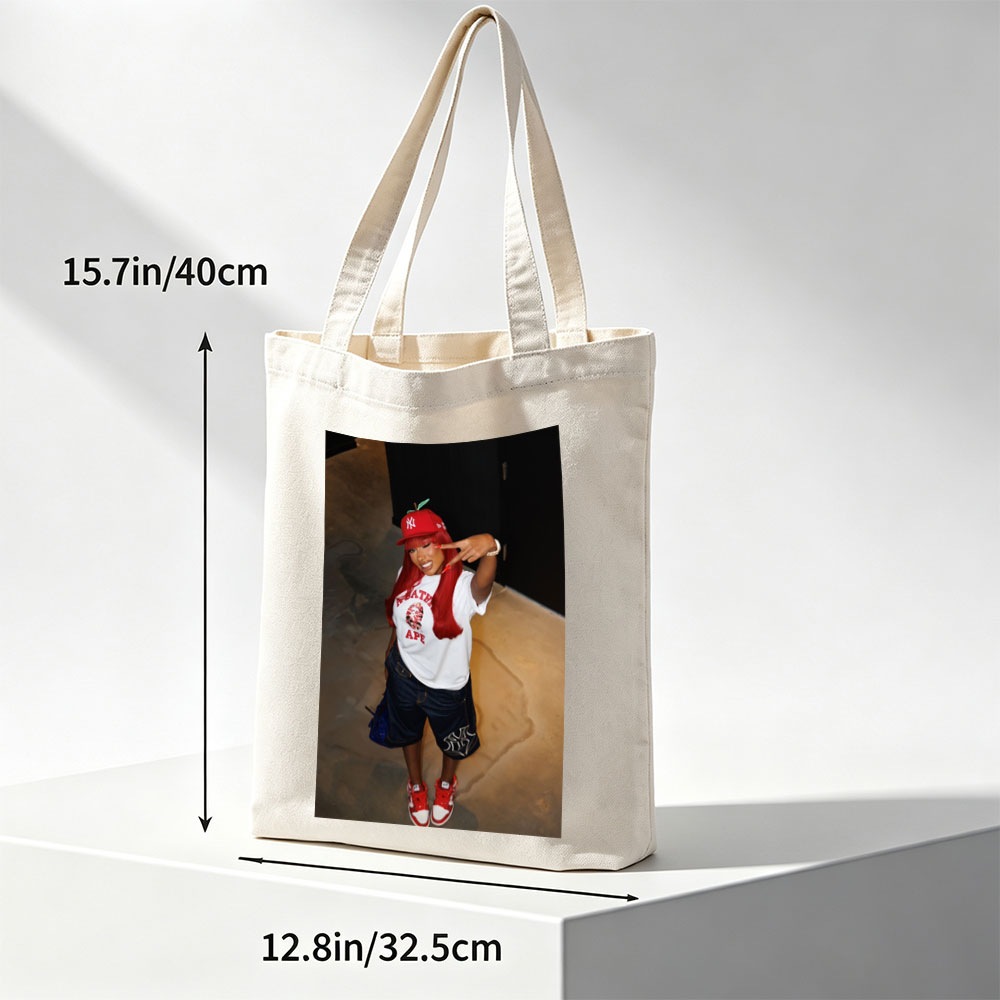 Nicki Minaj in a Red Apple Hat and A Bathing Ape Shirt, Striking a Pose with a Peace Sign - Canvas tote bags