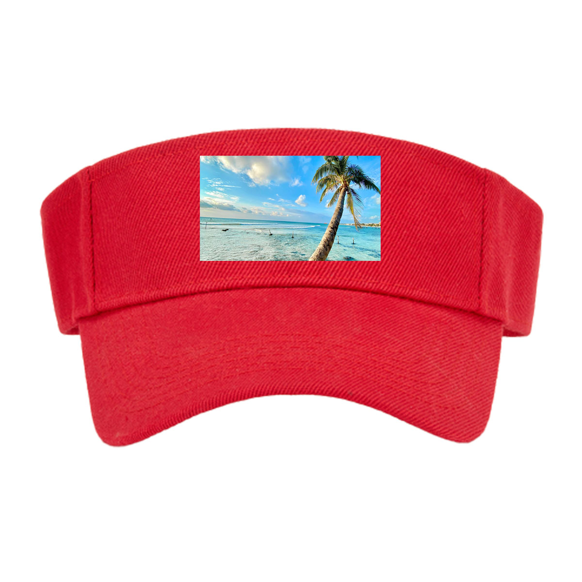Tropical beach with palm tree leaning over clear blue water under a bright sky. -  Visor cap