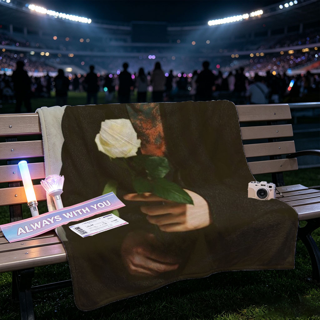 Yosuke Sugino Holding a White Rose in a Stylish Black Outfit with Petals Scattered Around - Blankets