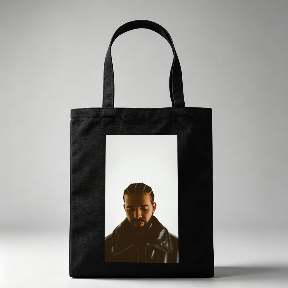 Drake in a Moody Portrait Wearing a Black Leather Jacket with Braided Hair and a Contemplative Expression - Canvas tote bags