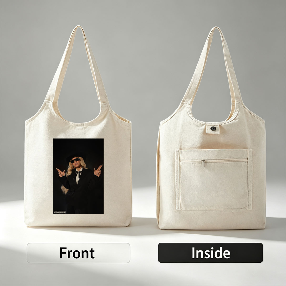 Beyonce in a Bold Black Suit and Hat Making Peace Signs Against a Dark Background - Canvas shoulder bags/