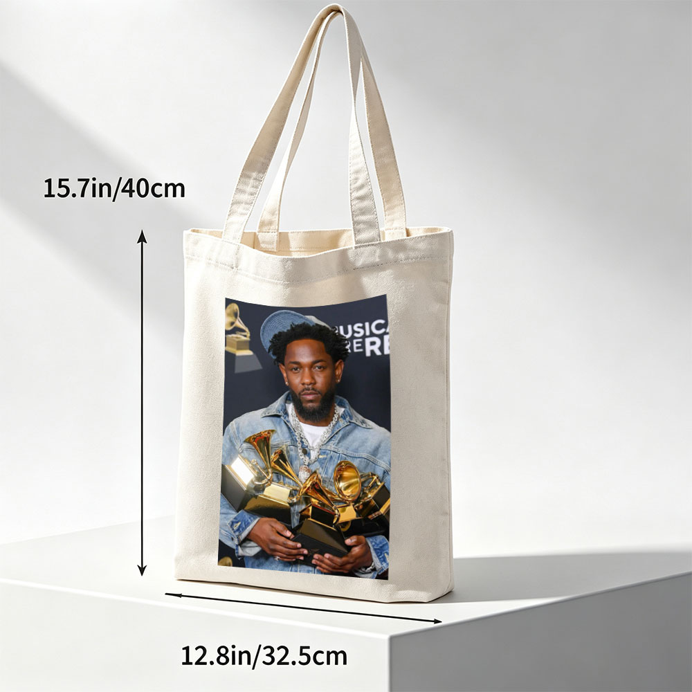 Kendrick Lamar at the Grammy Awards Holding Multiple Trophies - Canvas tote bags