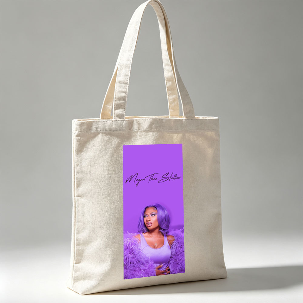 Megan Thee Stallion in Purple Feathered Outfit Against Vibrant Purple Background - Canvas tote bags