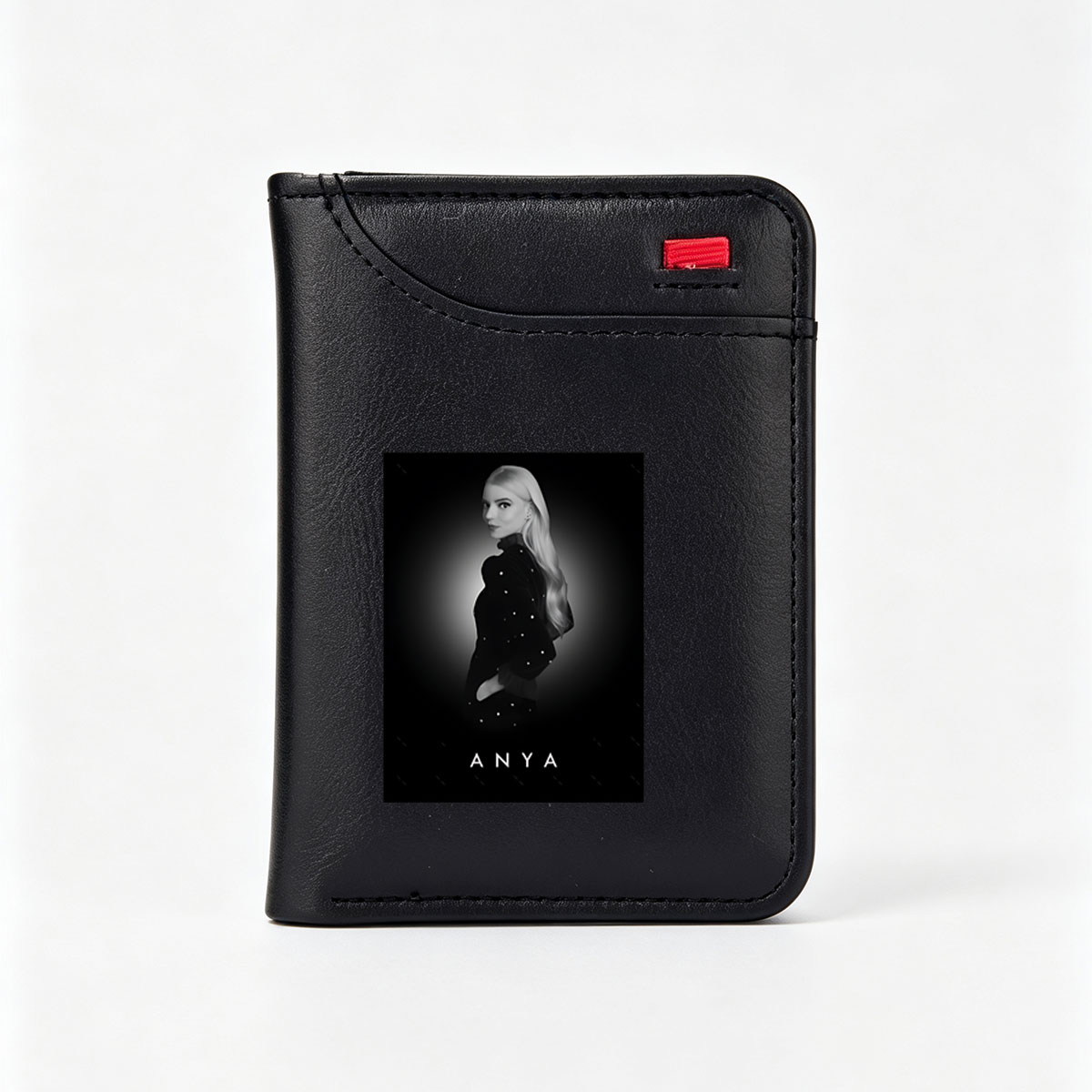 Anya Taylor-Joy in a striking black-and-white portrait, showcasing elegance and poise. - Vertical Style Wallet