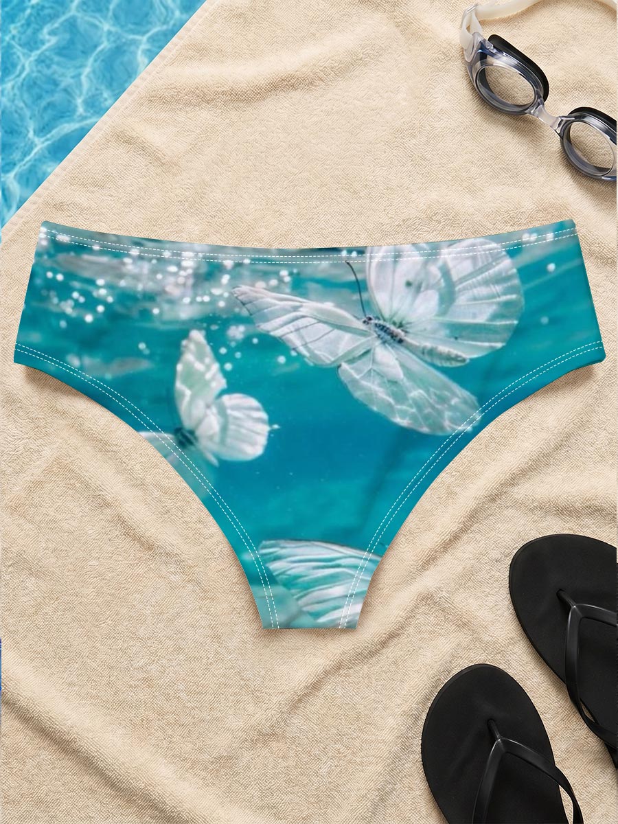 Butterflies floating underwater in clear blue water -  Men's swim trunks