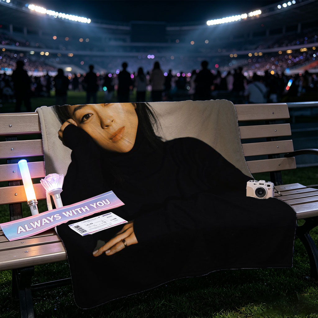 Yoko Kanno in a Moody Portrait Wearing Black Turtleneck with Dramatic Lighting - Blankets