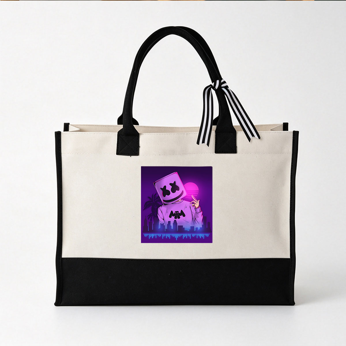 Marshmello in a vibrant neon cityscape, wearing a pink hoodie with a bat logo, making a peace sign against a purple sunset. - Canvas patchwork gift tote bag