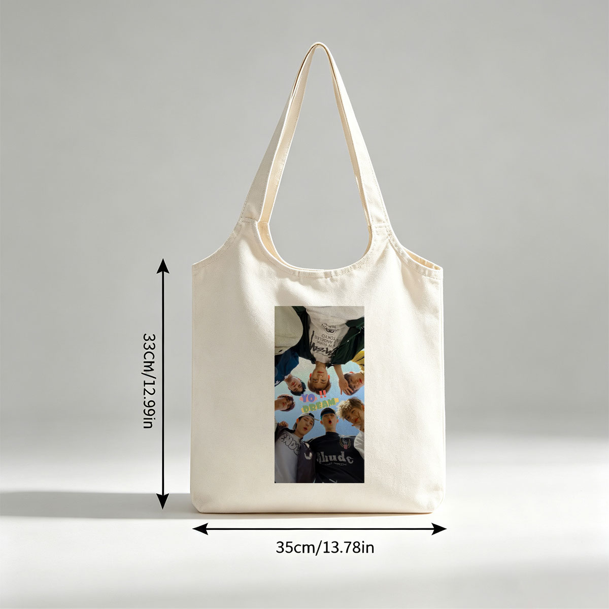 YOASOBI Dream Team Members in a Circular Pose Under Blue Sky - Canvas shoulder bags/