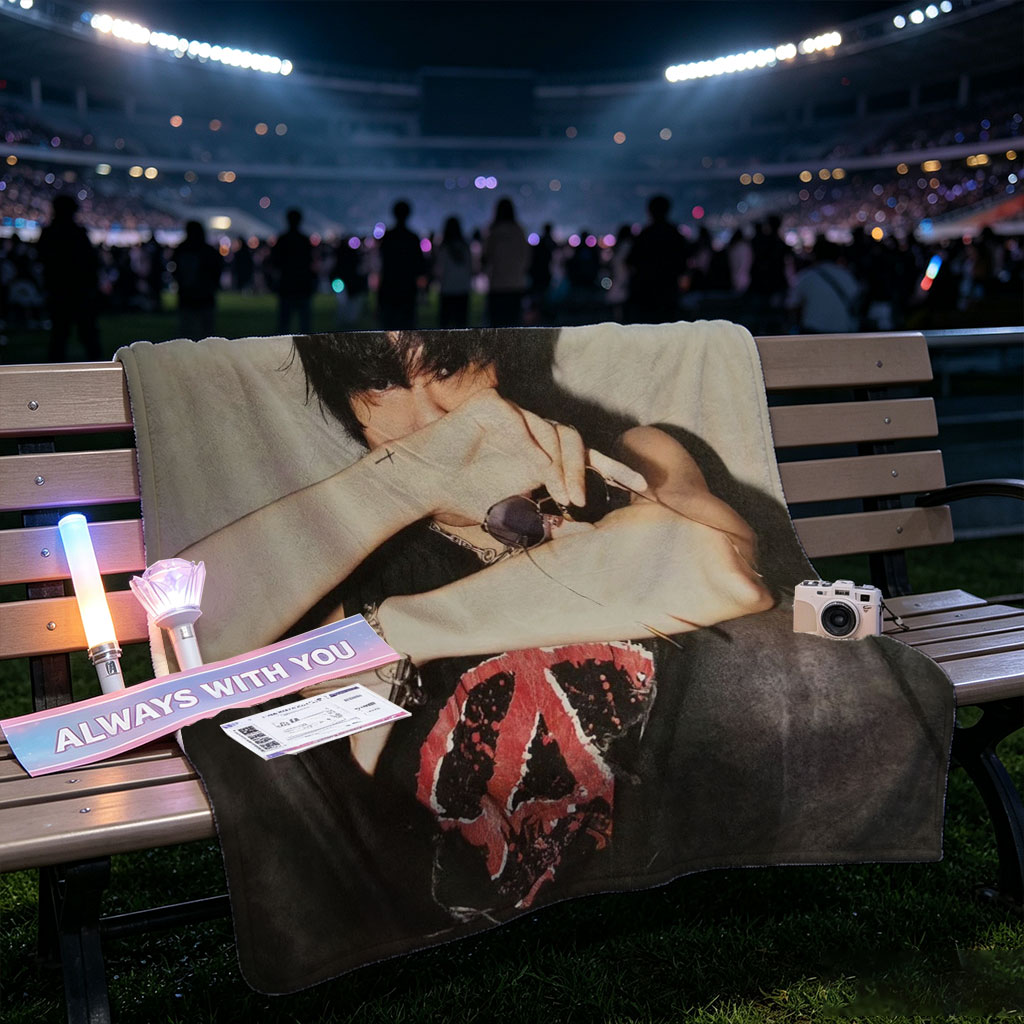 Hyunjin of Stray Kids in a Moody Pose with Sunglasses and Cross Tattoo, Wearing a Black T-Shirt with Red Peace Symbol Design - Blankets