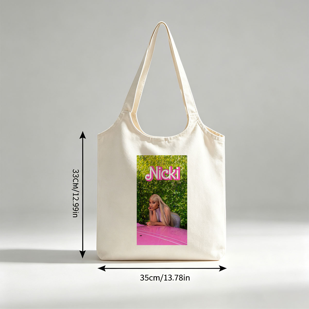 Nicki Minaj Leaning on Pink Car in Front of Green Hedge Wall - Canvas shoulder bags/