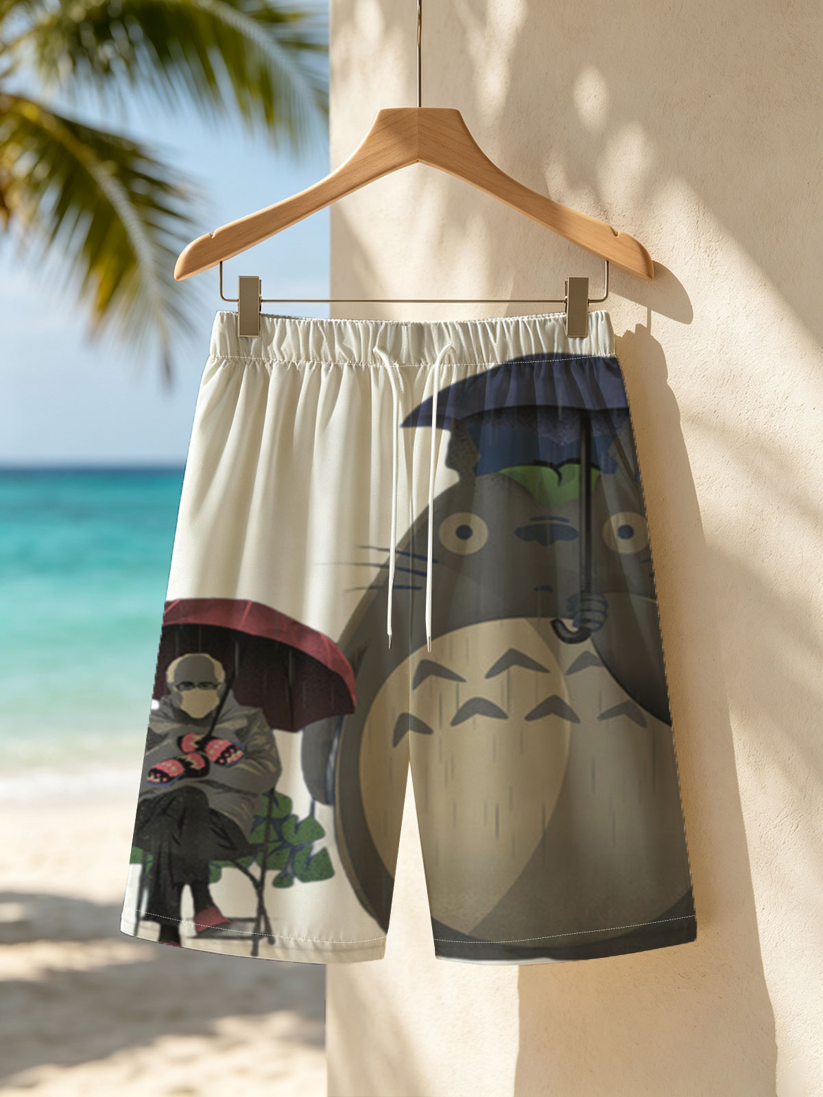 Totoro and a Person Under Umbrellas in the Rain -  Beach shorts